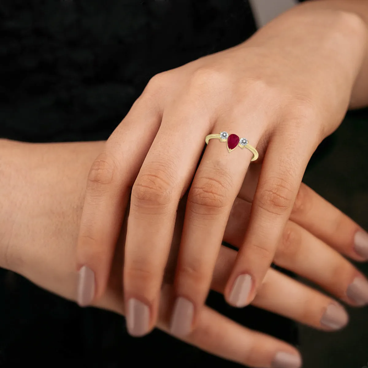 1/2 Carat Tw Pear Shape Ruby And Diamond Ring In 10K Yellow Gold