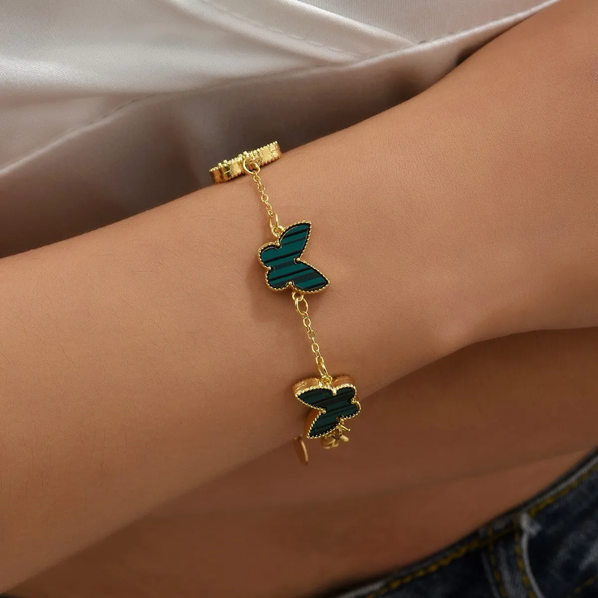 18K Gold Butterfly/Clover Design Exquisite Unique Bracelet