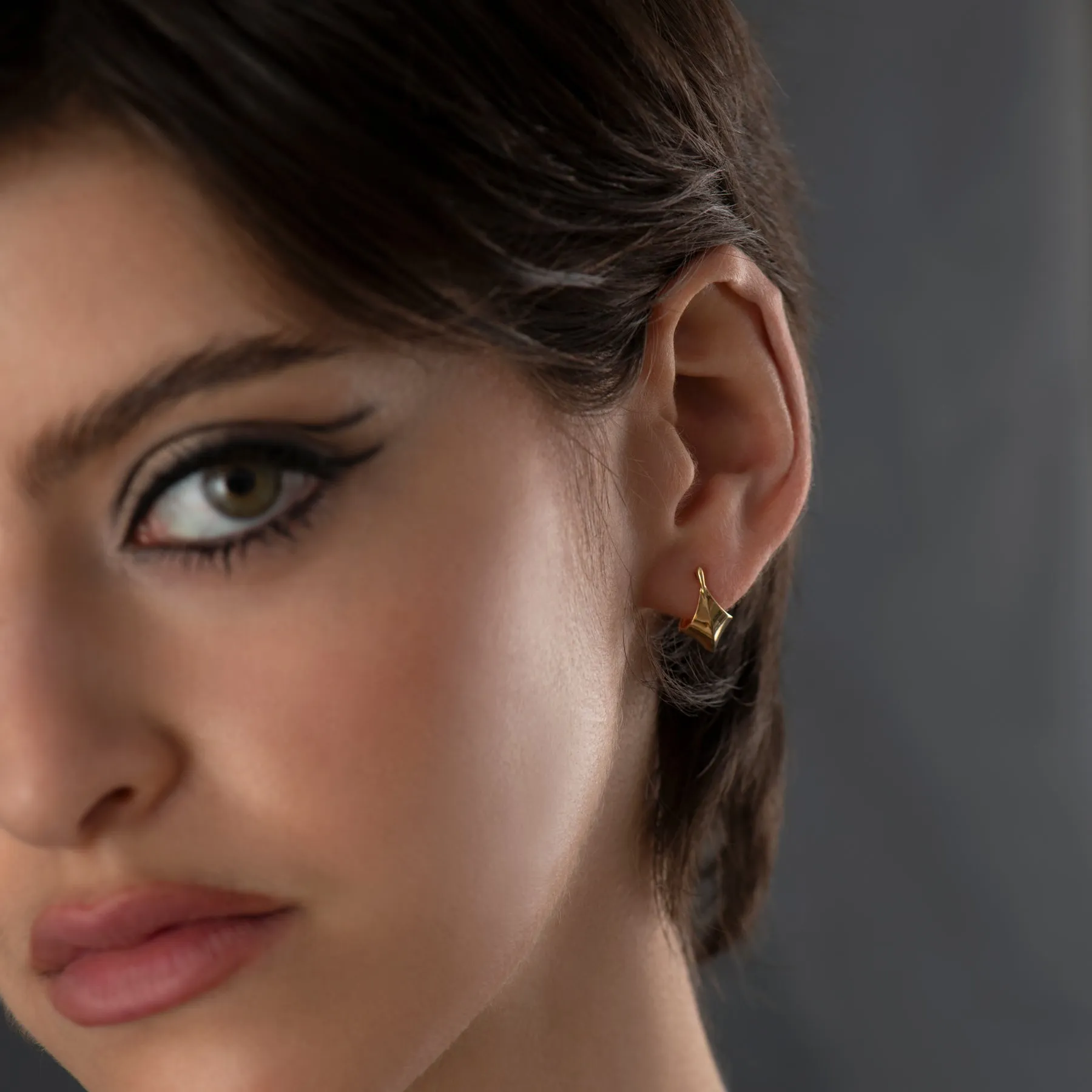 Gold Edgy Huggie Earrings
