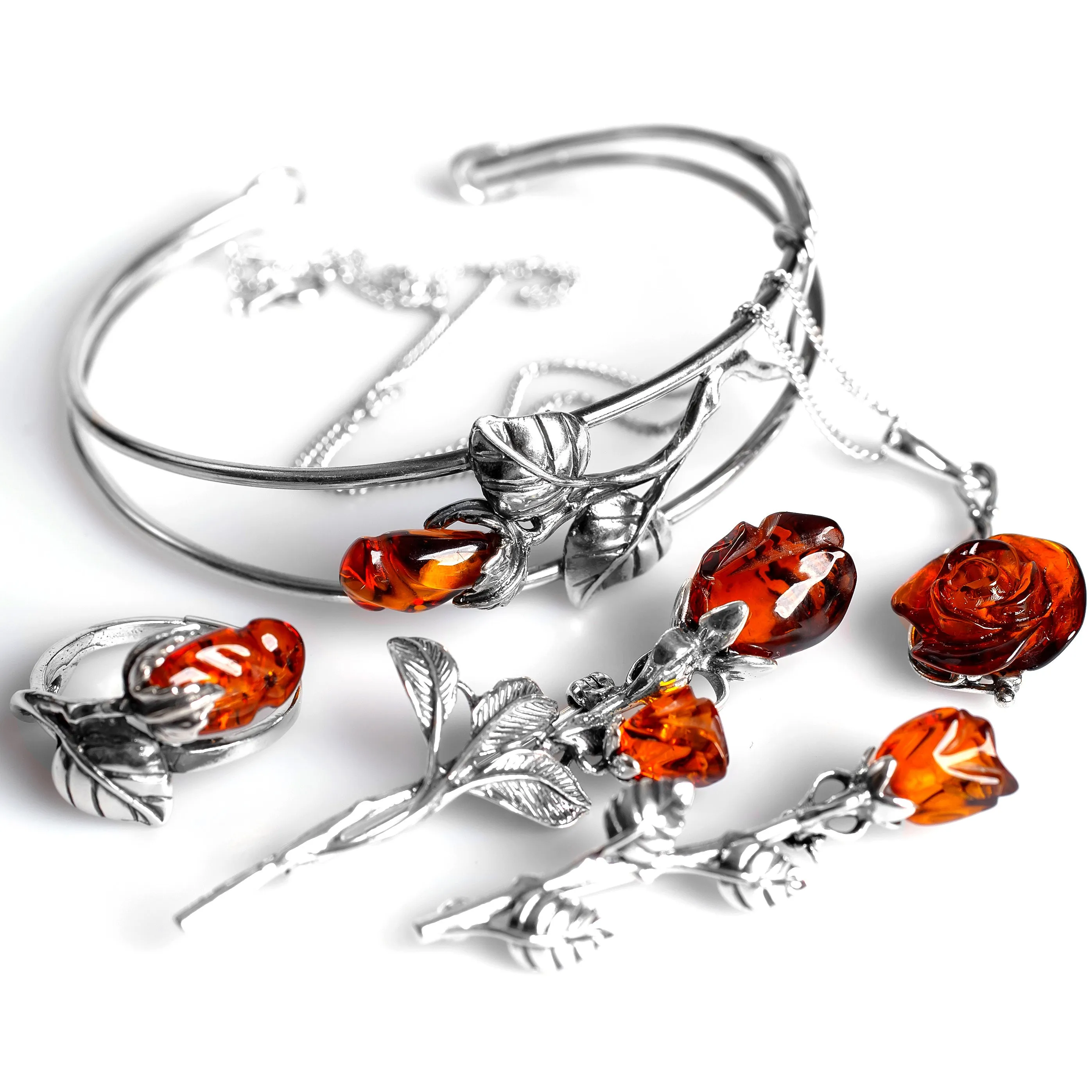 Single Stem Rose Brooch in Silver and Cognac Amber